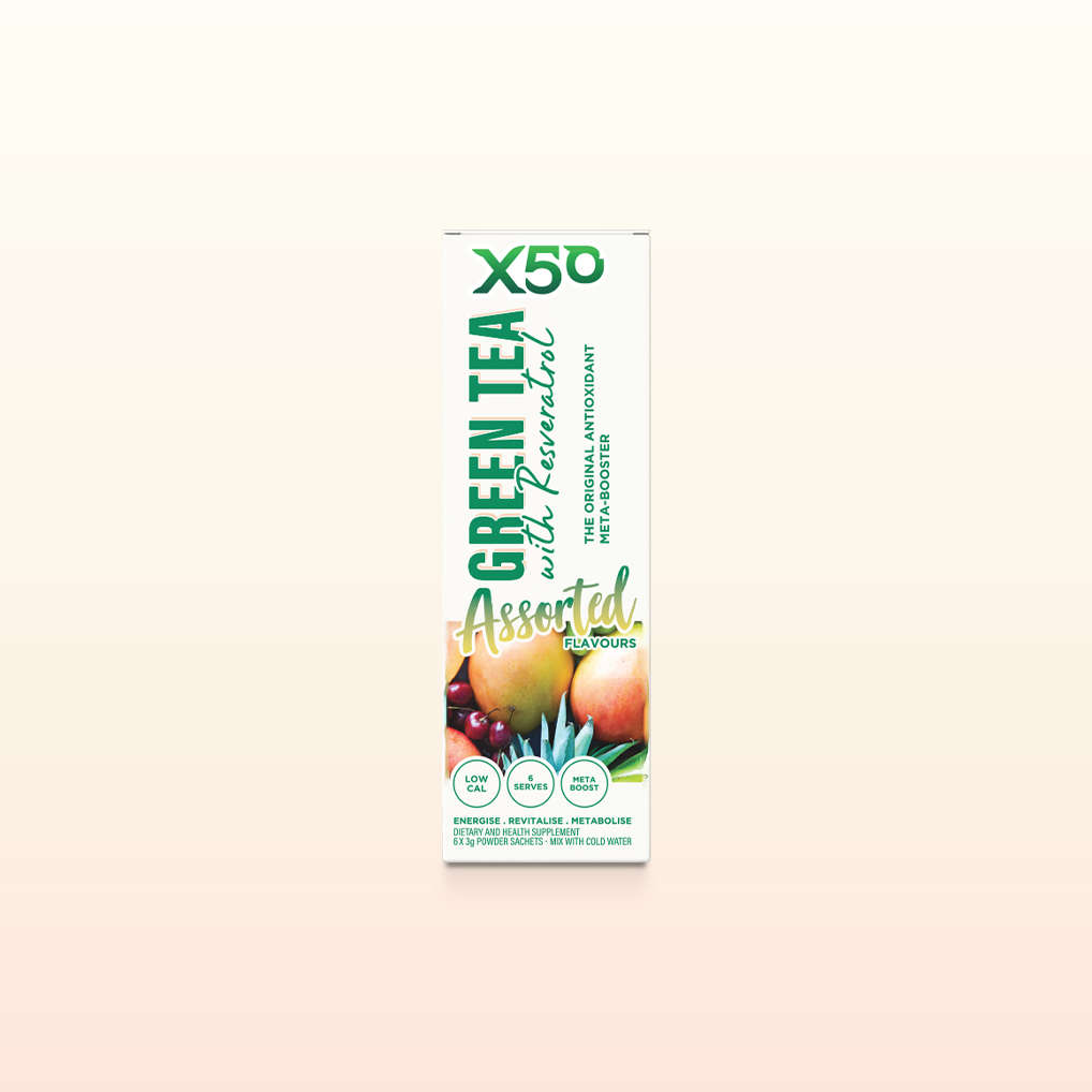X50Lifestyle Apple Berry Green Tea cup pour lifestyle shot